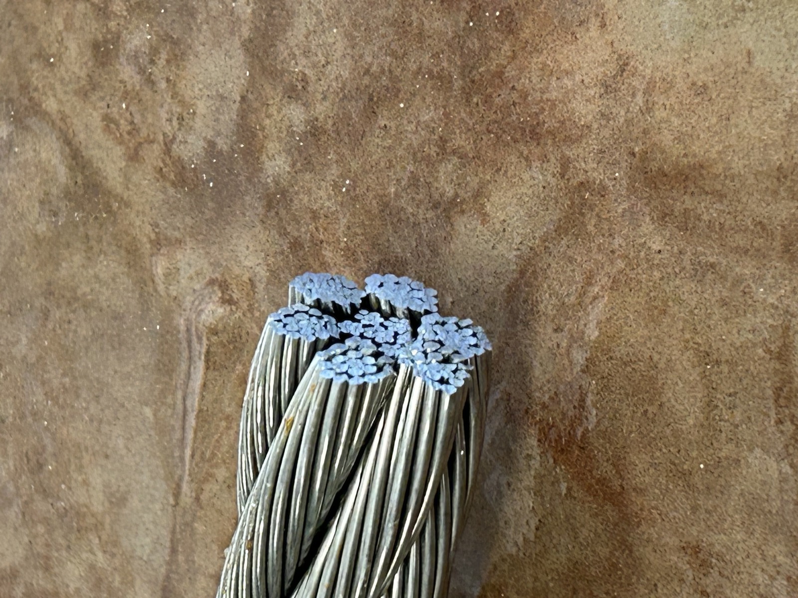 Clean-cut steel cable cross-section